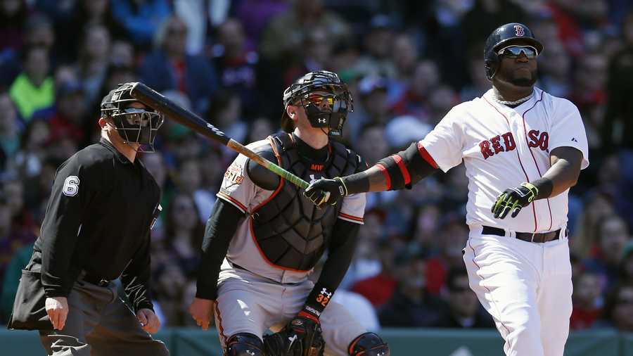 Boston Red Sox's David Ortiz watches his home run in front of Baltimore Orioles' Matt Wieters in the fourth inning of a baseball game in Boston, Saturday, April 19, 2014. (AP Photo/Michael Dwyer)