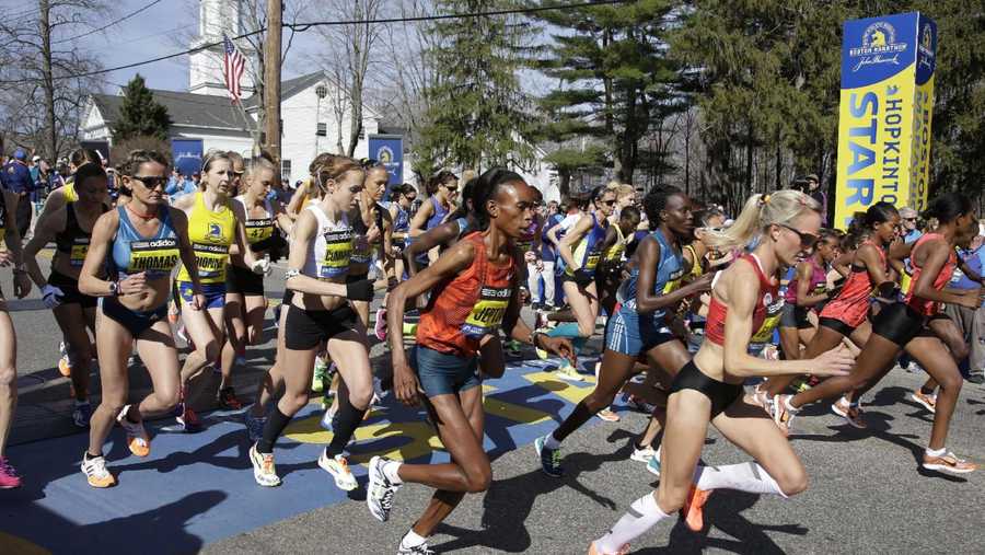 Elite women runners leave the start line of the 118th Boston Marathon Monday, April 21, 2014 in Hopkinton, Mass. 