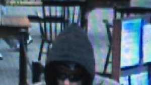 Robbery - Case No. 140223April 18, 2014Lynn : Eastern Bank 112 Market StCase Details:On 4/18/14, 1513 hrs., Eastern Bank, 112 Market St., Lynn was robbed by the suspect in the attached photos. No weapon shown. A note was passed. The suspect may have waved down a passing vehicle when fleeing. Suspect described as a white male in his 30's, 5'11"-6'2" tall, with a thin build. Suspect was wearing jeans, sneakers, a ¾ length gray Carhartt style jacket, a dark hoody, sunglasses, and a dark knit hat possibly with a Patriots logo.If you have any information about the identity of this person or where they are, please contact:Lynn Police Department: (781) 595-2000 x 4321Investigator: Det. Tom MulveyCase Submission No.: 140223 
