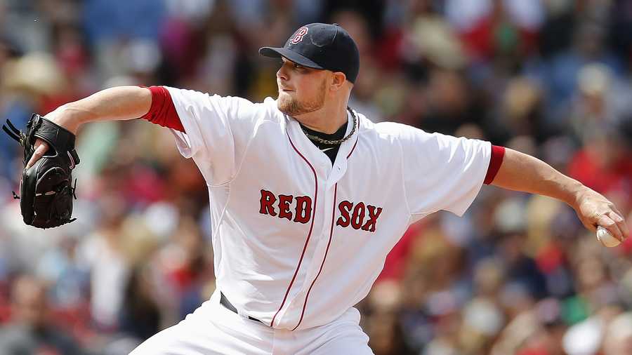 Boston Red Sox's Jon Lester pitches in the third inning of a baseball game against the Oakland Athletics in Boston, Saturday, May 3, 2014. (AP Photo/Michael Dwyer)   