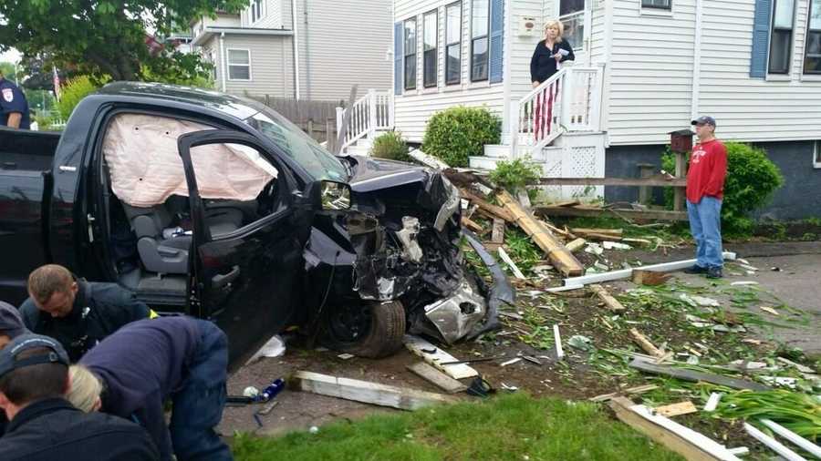 An SUV plowed into two homes in Winthrop on Saturday, firefighters said.