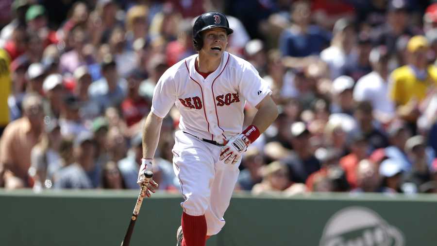 Boston Red Sox's Brock Holt advances after hitting a ground rule double off a pitch by Tampa Bay Rays' Erik Bedard in the third inning of a baseball game, Sunday, June 1, 2014, in Boston. (AP Photo/Steven Senne)