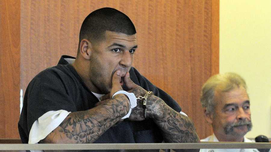 Former New England Patriot Aaron Hernandez was first charged with the 2013 murder of Odin Lloyd. Lloyd's body was found in an industrial park about a mile away from Hernandez's house with multiple gunshot wounds to the back and chest.