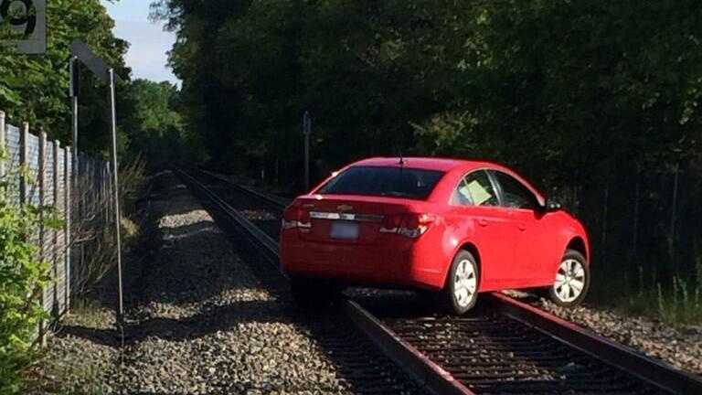 Car gets stuck on MBTA commuter rail tracks
