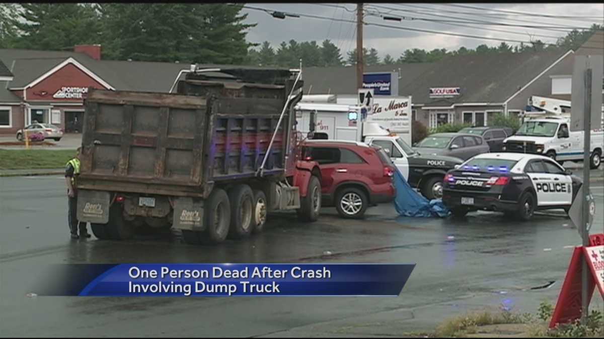 Woman killed in collision with dump truck