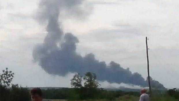 A passenger plane carrying 295 people was shot down Thursday over a town in eastern Ukraine. 