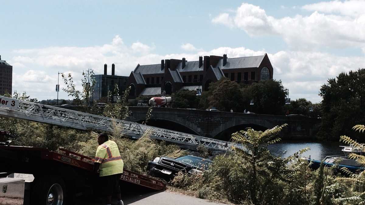 Images: SUV crashes into Charles River