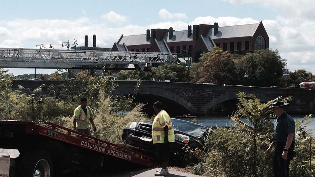Images: SUV crashes into Charles River
