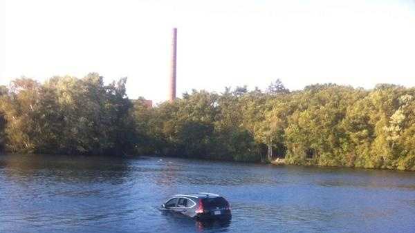 SUV rolls down boat ramp into Charles River