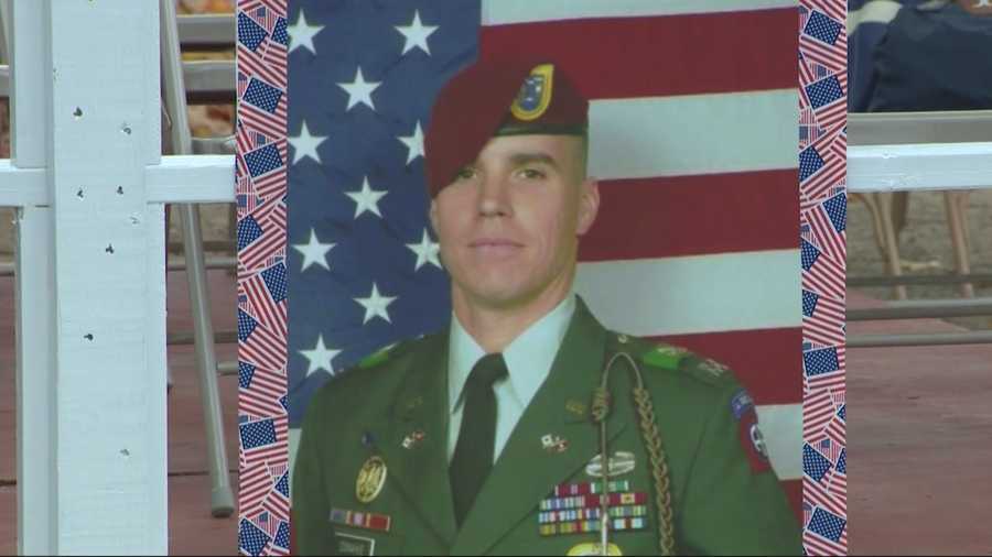 Hundreds gathered Sunday in Whitman to remember and pay tribute to Maj. Michael Donahue, who was killed in Afghanistan last month.