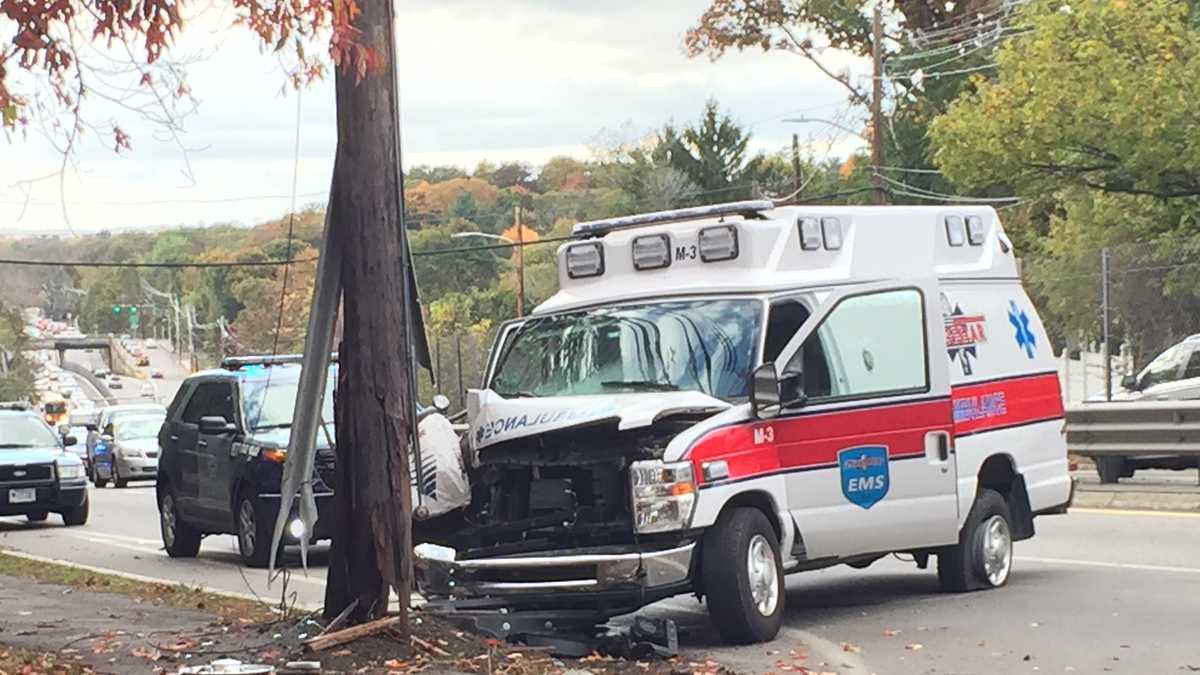 3 injured when ambulance crashes into utility pole
