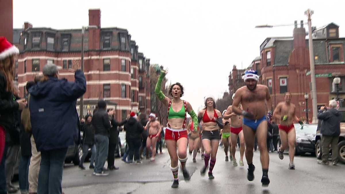 Photos Hundreds of Santas run in Speedos for charity
