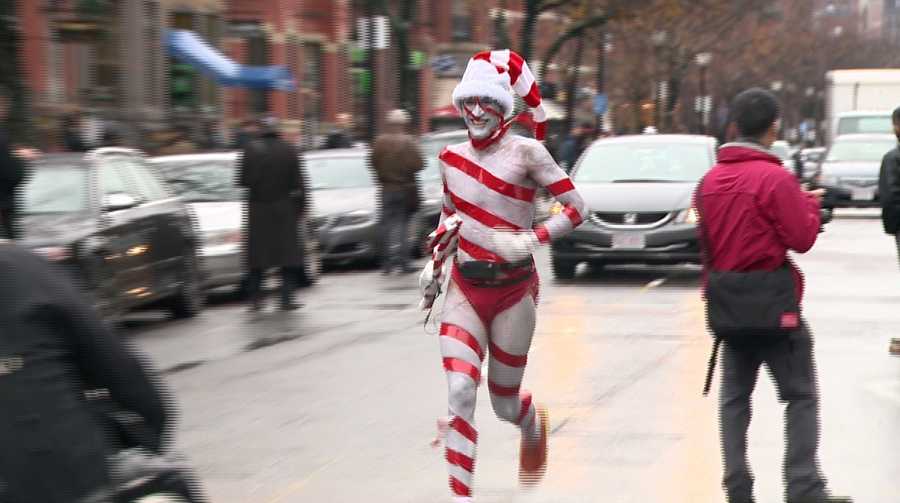 Photos Hundreds of Santas run in Speedos for charity
