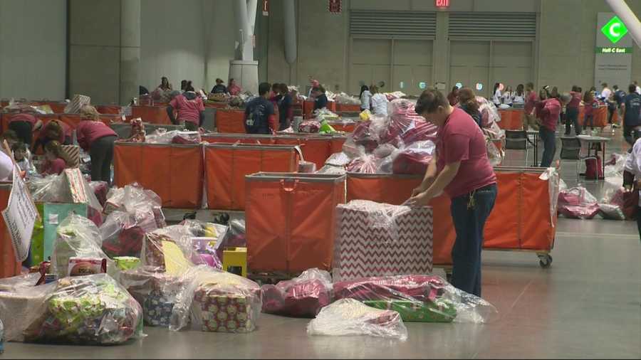 Christmas In The City, a holiday party for families in need, celebrated 26 years of giving in Boston on Sunday.