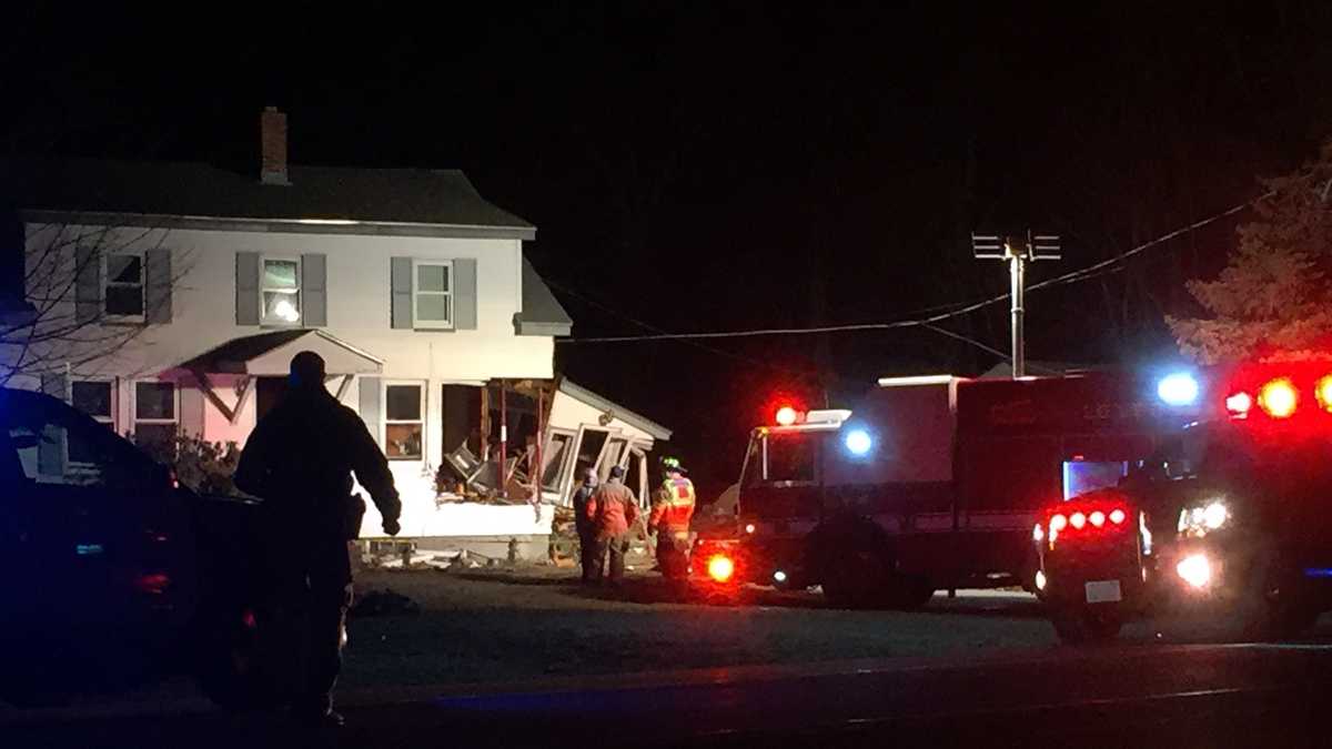 Driver dies after car crashes into home