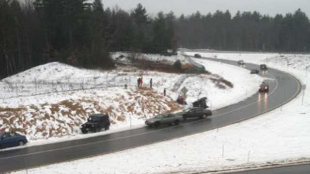 Images: Icy roads lead to dozens of accidents