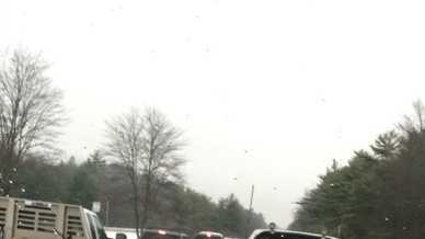 Images: Icy roads lead to dozens of accidents