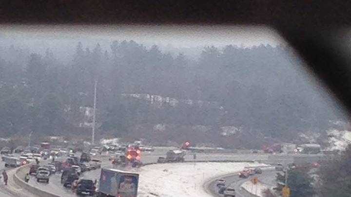 Images: Icy roads lead to dozens of accidents