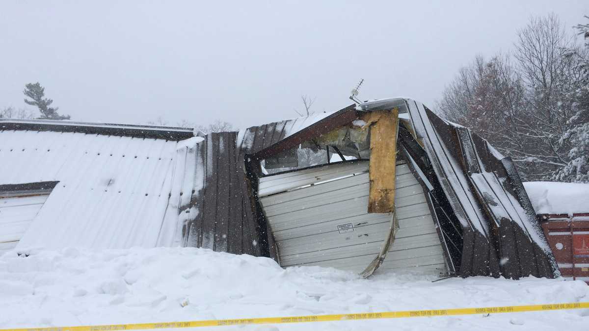 Roofs collapse under weight of new snow