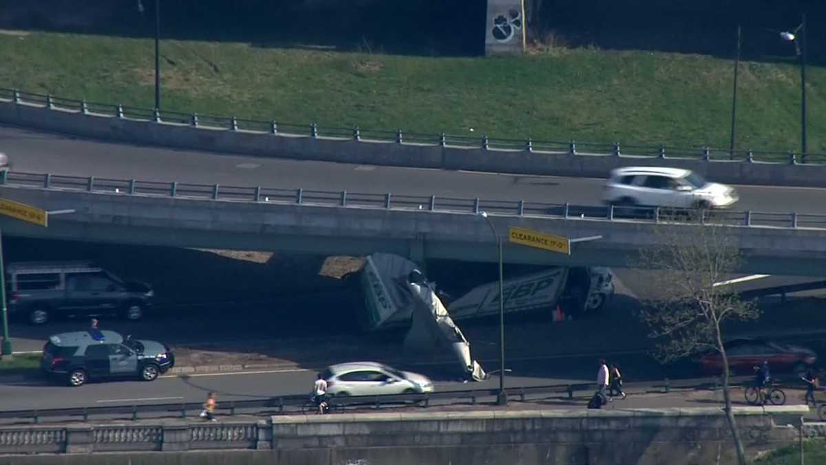 Photos: Top of truck sheared off by Storrow Drive overpass