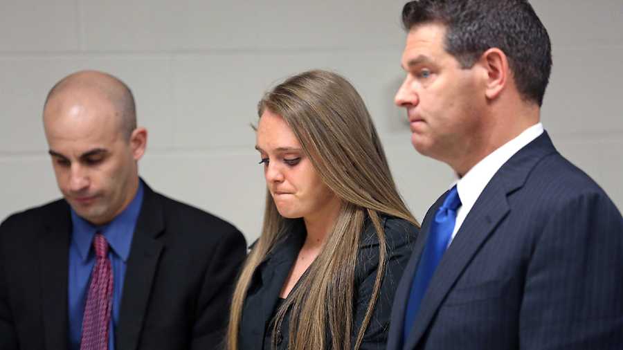 Michelle Carter appears for a hearing in court with her attorneys Cory Madera, left, and Joseph Cataldo, Thursday, April 23, 2015, in New Bedford, Mass.