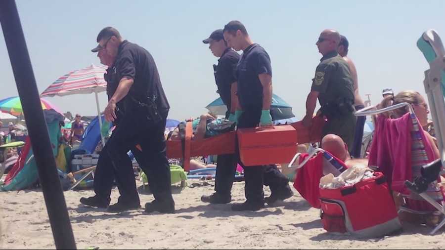 Officials are trying to determine what caused a blast that knocked a Rhode Island beachgoer to the ground, but left behind no evidence of an explosive device.