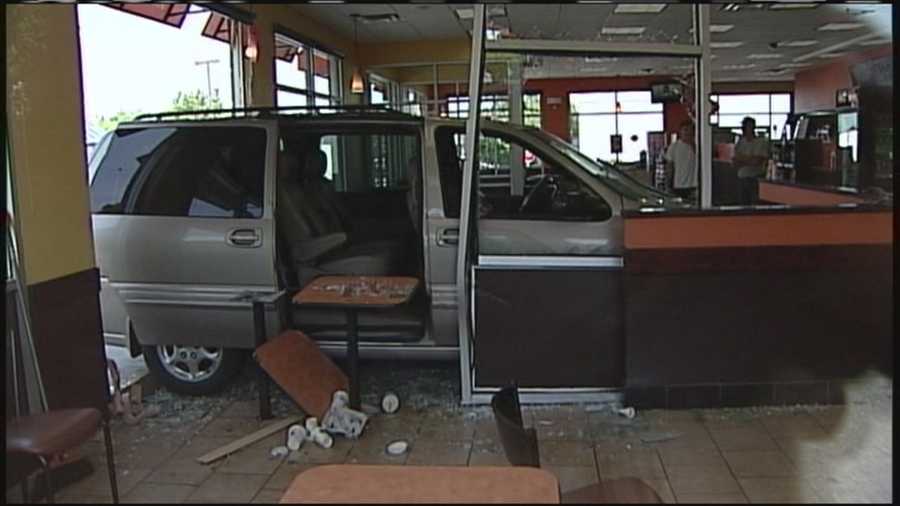 A van crashed into a Dunkin' Donuts store in Biddeford on Saturday morning.