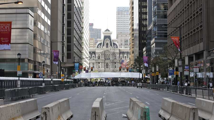A security checkpoint is set up in the middle of Market Street in Philadelphia on Friday, Sept. 25, 2015 before Pope Francis' upcoming visit. (AP Photo/Alex Brandon)