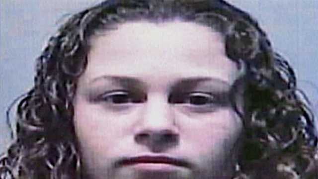 Stephanie Fox pictured after 2007 arrest for credit card theft