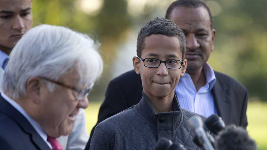 Ahmed Mohamed, second from right, listens as Rep. Mike Honda, D-Calif., left, speaks during a news conference on Capitol Hill in Washington, Tuesday, Oct. 20, 2015. Mohamed is the 14-year-old “clock kid”, freshman, who was arrested in Irving, Texas, for bringing an alarm clock science project to his high school teacher. To the far right is Ahmed's uncle Aldean Mohamed. 