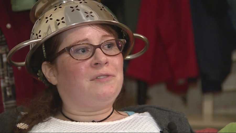 A Massachusetts woman has won a legal battle to wear a colander on her head in her state driver's license photo.