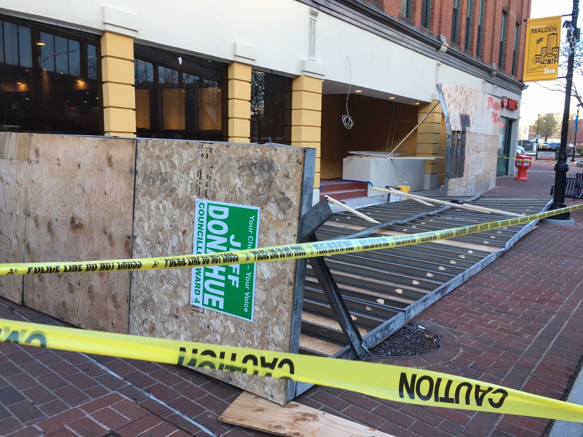 Mom baby taken to hospital after wall collapses on sidewalk