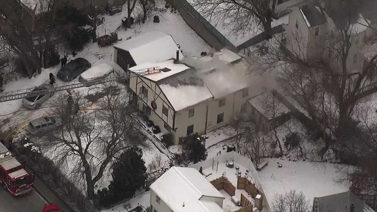 Firefighters battle multialarm fire inside Dedham home