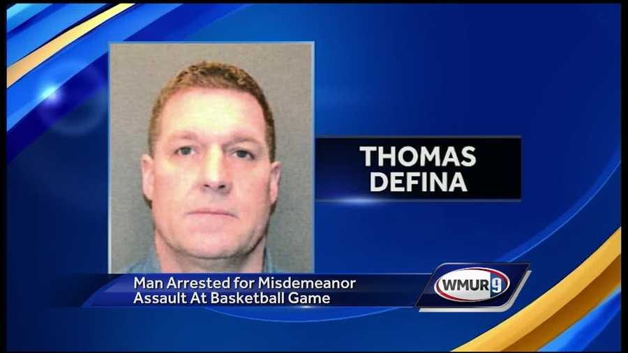 A misdemeanor assault charge was filed against a Manchester firefighter Wednesday after an incident at a high school basketball game in Wolfeboro.