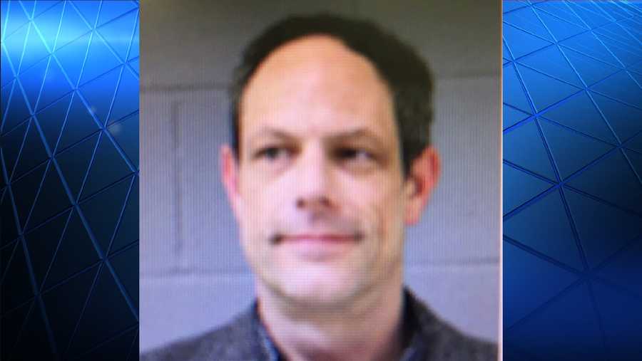 Newtown science teacher carried gun into school