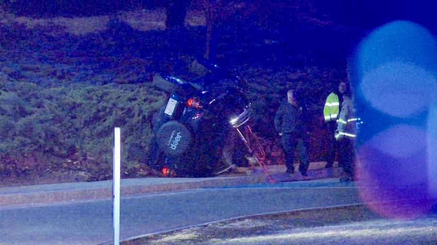 Vehicle flips over on college campus