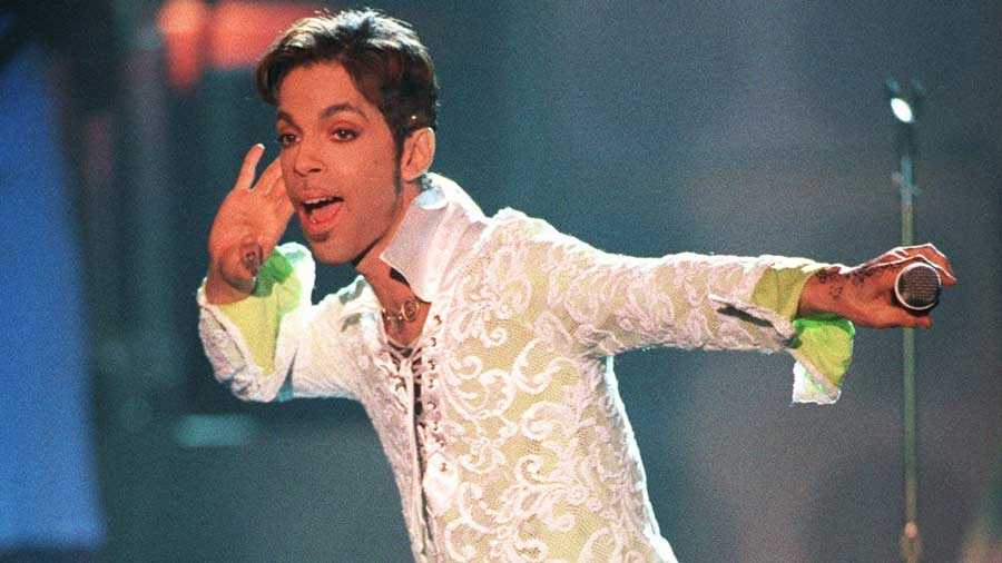 The artist formerly known as Prince performs a medley of "Take Me With U" and "Rasberry Beret" at the "4th annual VH1 Honors" Thursday night, April 10, 1997, in Universal City, Calif. 