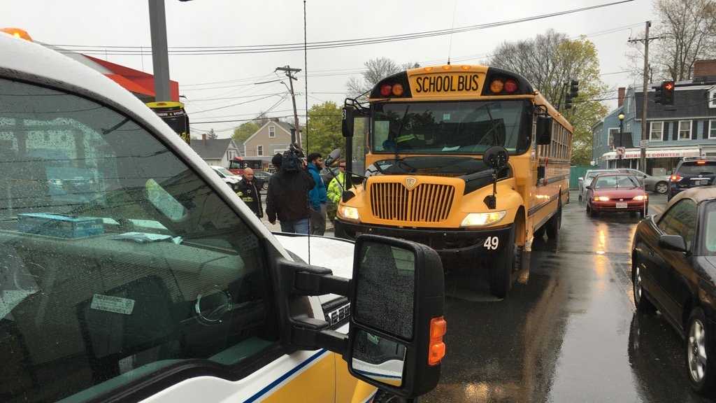 Vehicle collides with school bus with kids on board
