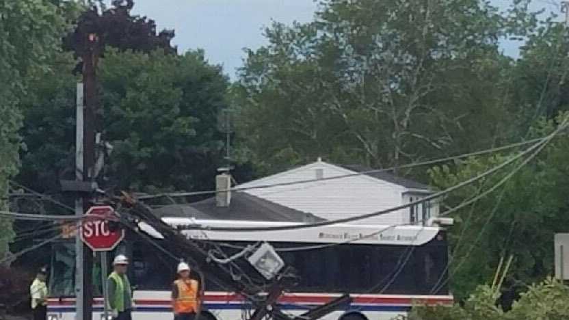Plaistow, NH: Bus trapped under wires in Plaistow after storms moved through. Everyone OK