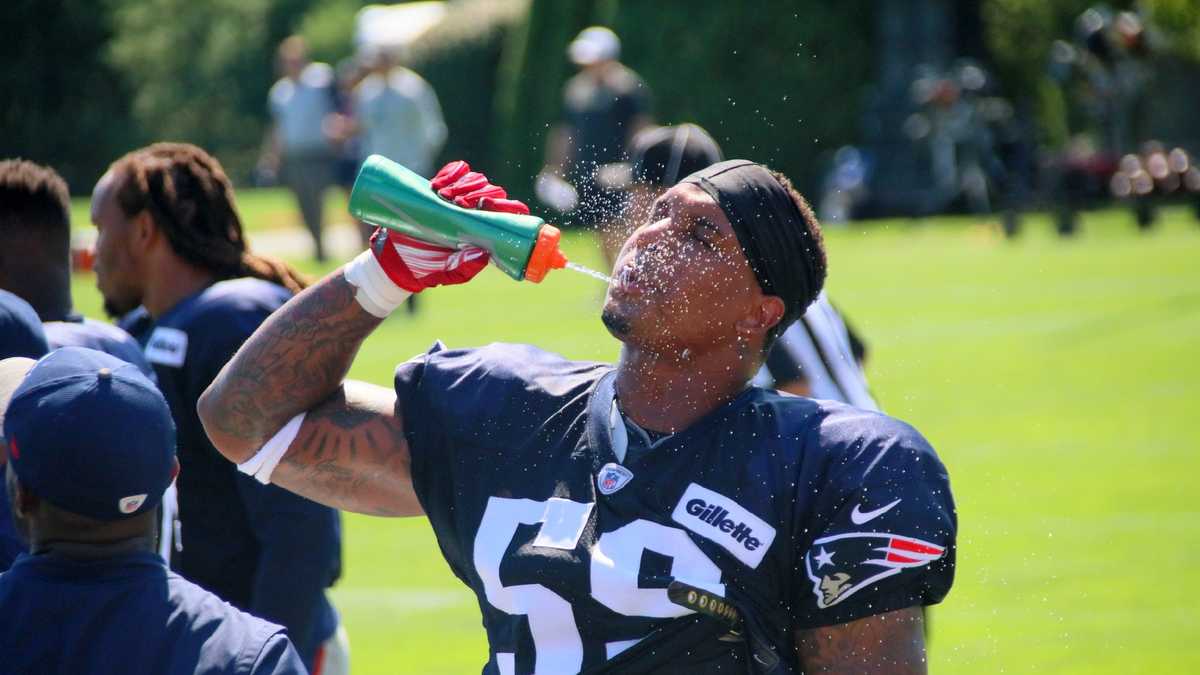 Patriots fans brave rain to watch first open practice