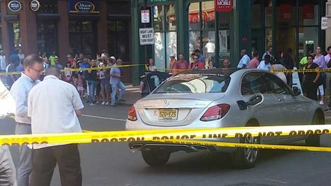 Car strikes pedestrians in Boston