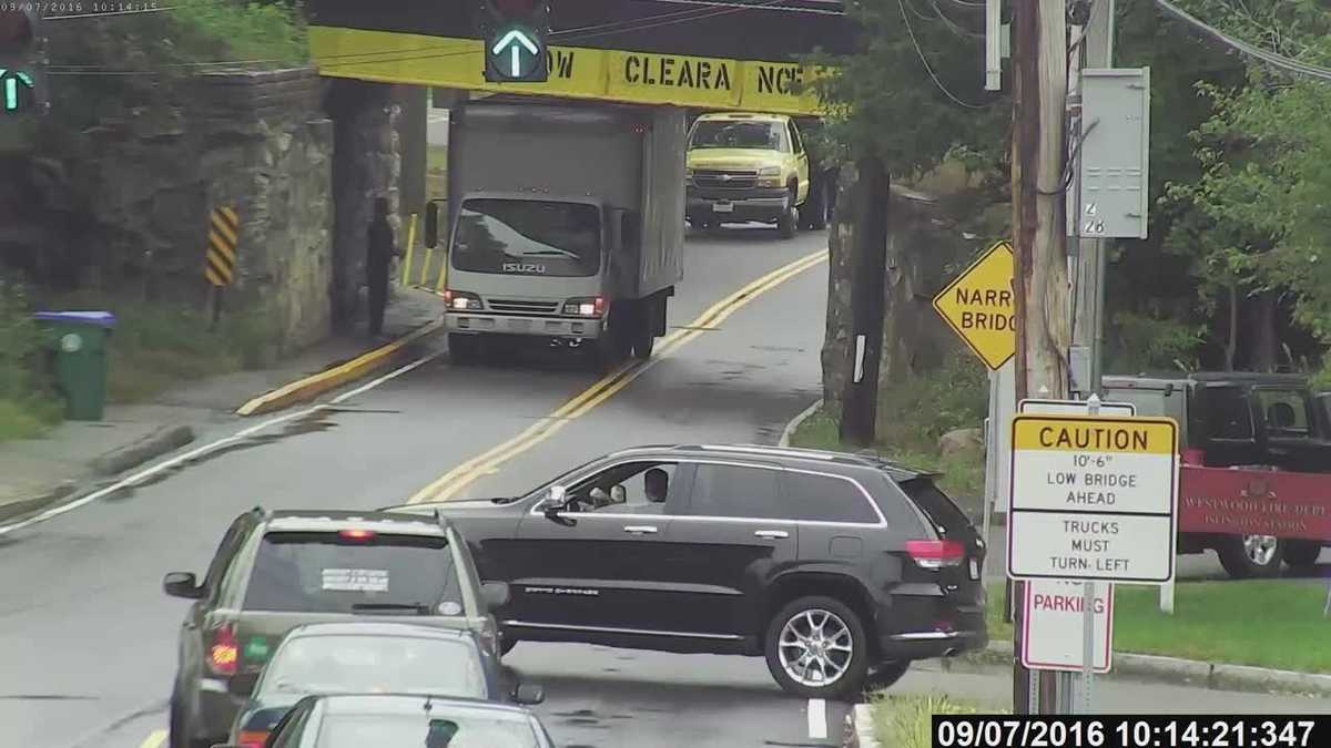 Truck gets caught under East Street Bridge in Westwood