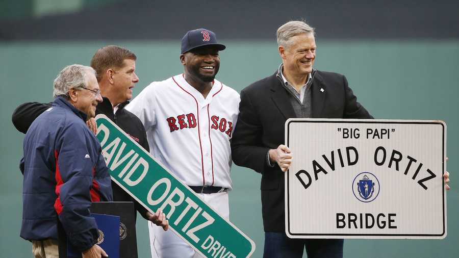 Boston Red Sox's David Ortiz, center, stands with Massachusetts Gov. Charlie Baker, right, Boston Mayor Marty Walsh, second from left, and Massachusetts Speaker of House Robert DeLeo during a ceremony to honor Ortiz before a baseball game against the Toronto Blue Jays in Boston, Sunday, Oct. 2, 2016.