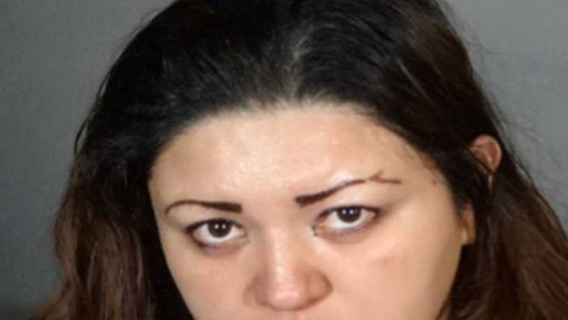 This undated law enforcement booking photo provided by the Los Angeles Police Department shows Veronica Aguilar, 39. Aguilar has been charged with murder in the death of her severely malnourished 11-year-old son Yonatan, whose body was found wrapped in a blanket in a closet in their Los Angeles home Monday, Aug. 22, 2016. Aguilar was charged Thursday, Aug. 25, with one count each of murder and child abuse in the death of her son.