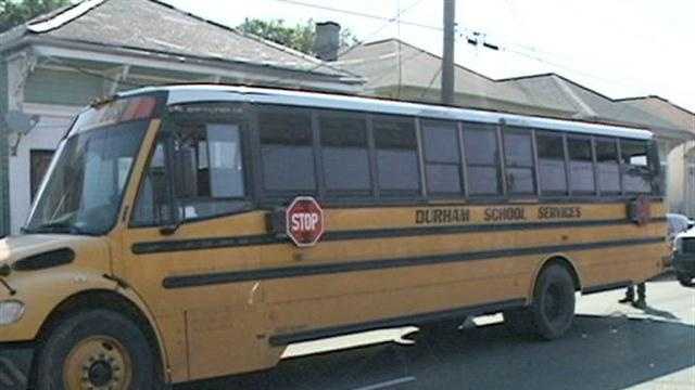 New Orleans police officers arrested a man who hit a school bus in Mid-City Monday morning and booked him with driving while intoxicated.