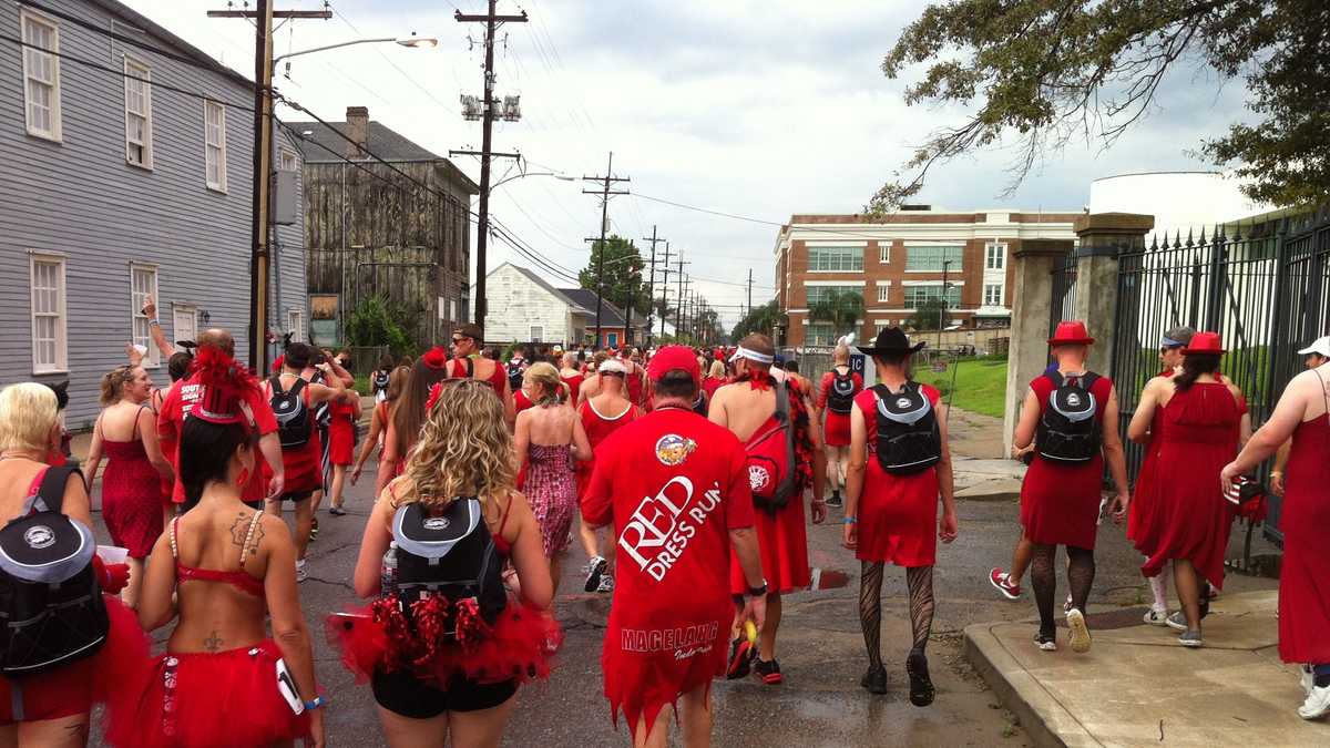 Rain, revelers and red dresses: Images from the 2012 Red Dress Run