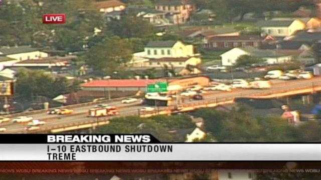 An overturned milk truck shuts down Interstate 10 in Treme Wednesday morning.