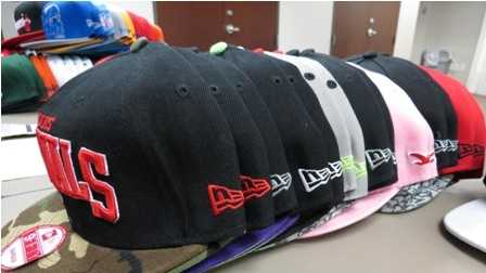 Agents seize hundreds of counterfeit hats, jerseys