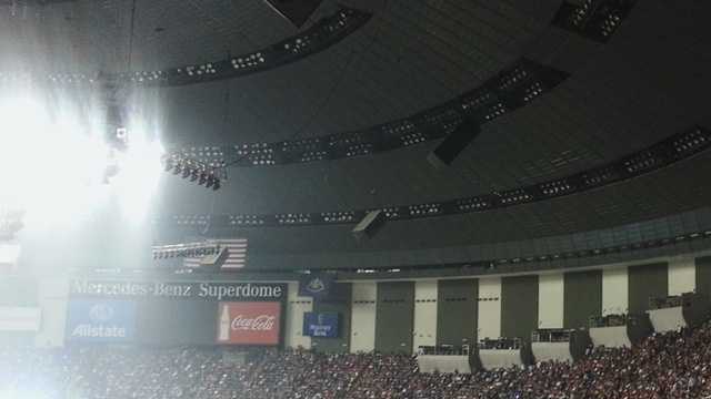 Half of the Mercedes-Benz Superdome is plunged into darkness about 7:35 p.m. -- in the middle of Super Bowl XLVII.