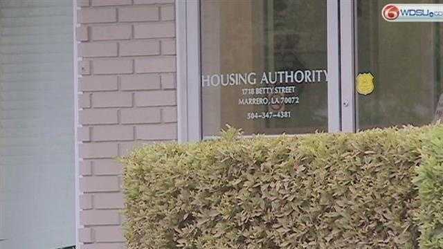Report said housing authority violated federal law in how it paid its board members.